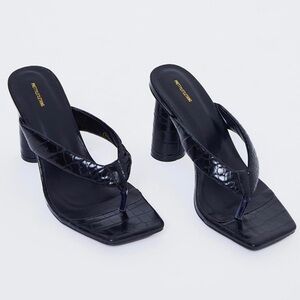 Brand new faux snakeskin heel